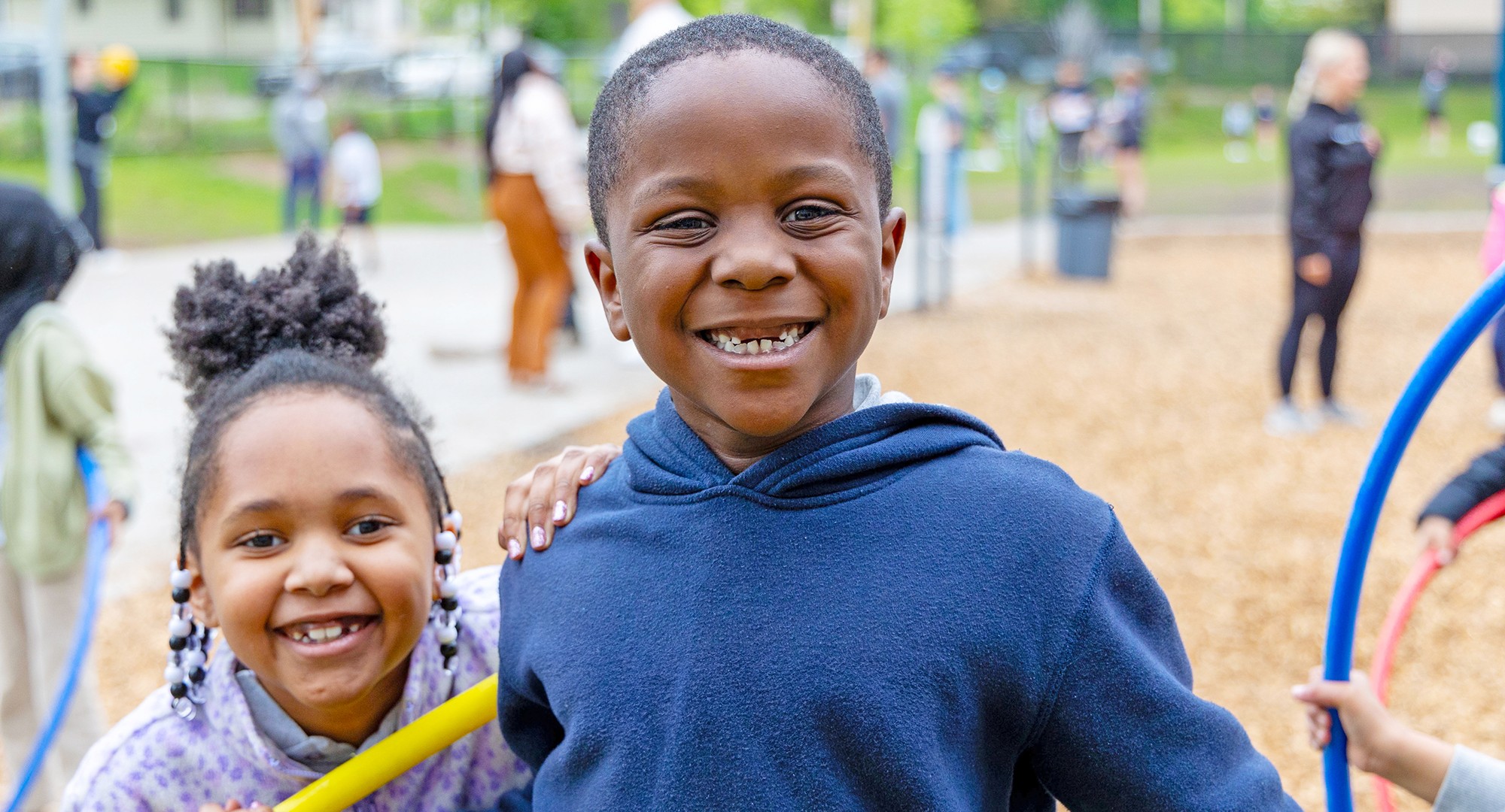 Kids smiling on the playground