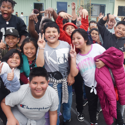 Large Group of Kids Pose on the Playground