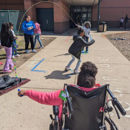 Student in wheel chair spends jump rope for friends