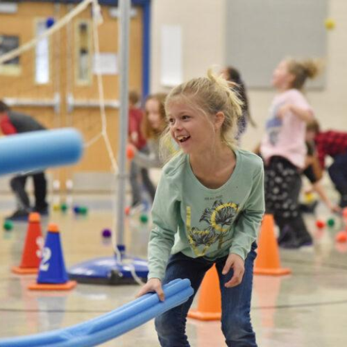 Student playing indoors